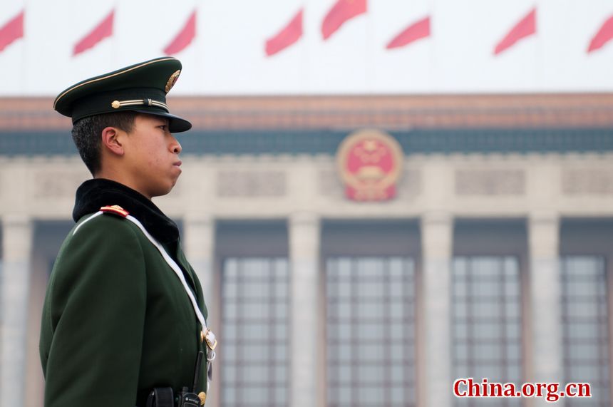 A solider on duty at the Tian&apos;anmen Square near the Great Hall of the People, the venue of China&apos;s National People&apos;s Congress. [China.org.cn]