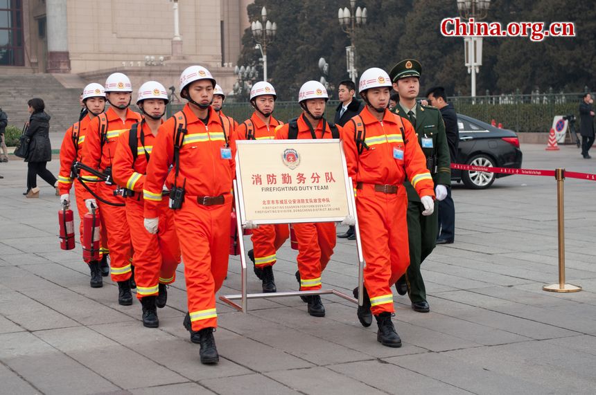Soldiers with the fire brigade that patrol the perimeter of the Great Hall of the People, the venue of China&apos;s National People&apos;s Congress. [China.org.cn]