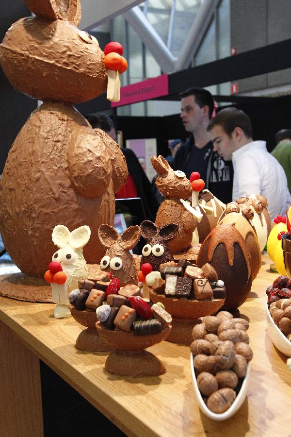 Mouse-shaped cakes are displayed during a bake exhibiton in Amsterdam, The Netherlands, on March 5, 2012. The 3-day bake exhibition, which opened on Sunday, means not only thousands kinds of delicious food, but also a competition of sweet art using flour, chocolate and sugar. (Xinhua/Sylvia Leiderer) 