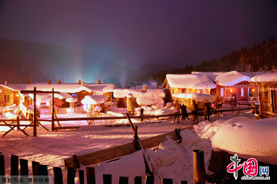 Closed off by surrounding mountains, the village, aptly named Xuexiang, or 'home of snow', has steadily build up its reputation among tourists over the last few years. It consists of around twenty wooden houses decorated with strings of golden corn and red chili hung to dry. In winter the snow here can reach up to two metres. This absorbs sound creating a winter wonderland. 