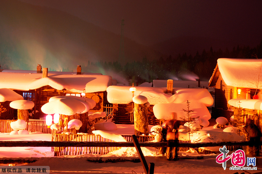 Closed off by surrounding mountains, the village, aptly named Xuexiang, or 'home of snow', has steadily build up its reputation among tourists over the last few years. It consists of around twenty wooden houses decorated with strings of golden corn and red chili hung to dry. In winter the snow here can reach up to two metres. This absorbs sound creating a winter wonderland. 