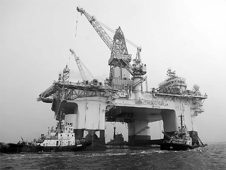 China National Offshore Oil Corp's newly built drilling platform in Yantai, Shandong province. CNOOC is likely to produce 340 million barrels of oil equivalent this year.[China Daily]