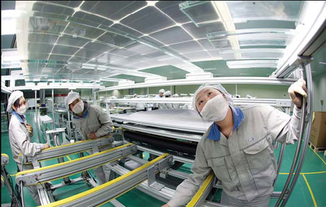 Workers in Lianyungang city, Jiangsu province, make solar panels for export to the US and Europe. Officials say it's likely the EU will investigate claims against Chinese makers of solar products. [China Daily]