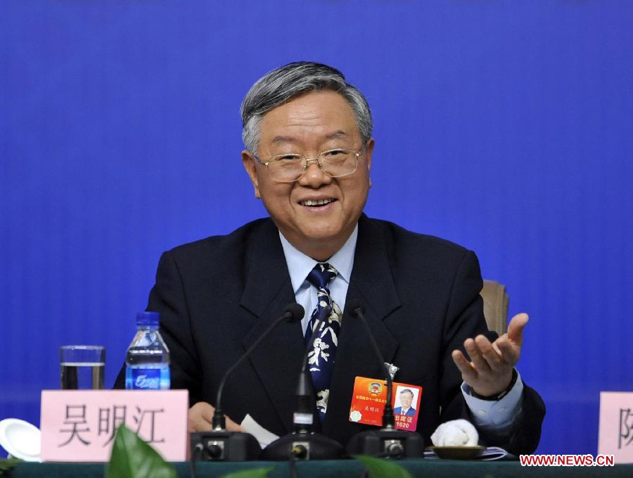 Wu Mingjiang, a member of the 11th National Committee of the Chinese People's Political Consultative Conference (CPPCC) answers questions from journalists during a news conference of the Fifth Session of the 11th CPPCC National Committee on the reform of medical, health care services in Beijing, capital of China, March 10, 2012. (Xinhua/Wang Peng) 