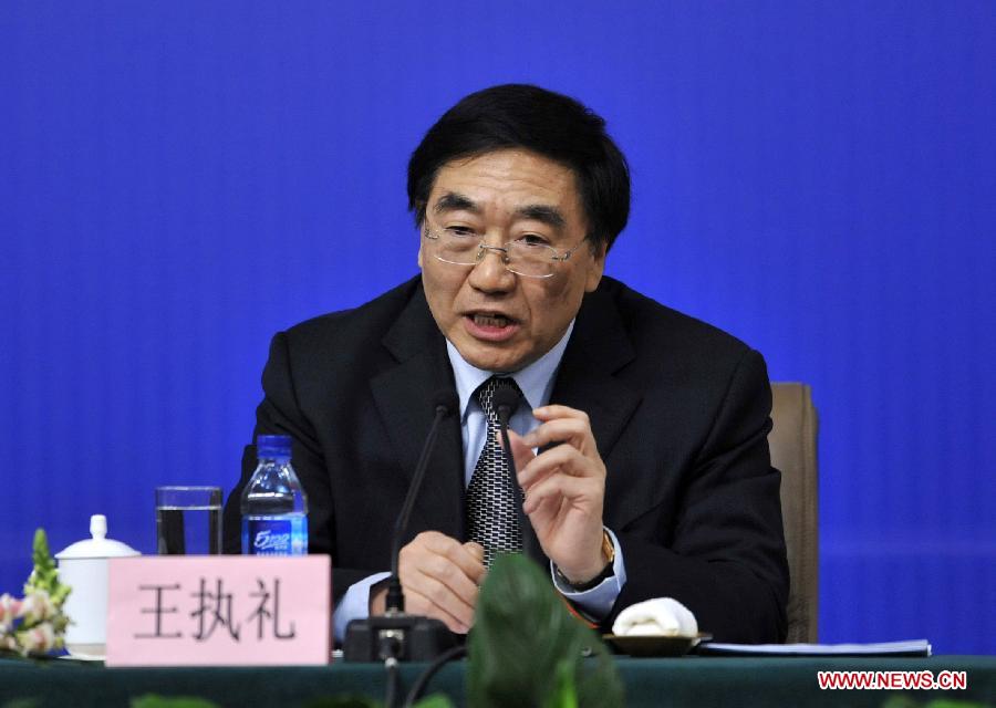 Wang Zhili, a member of the 11th National Committee of the Chinese People's Political Consultative Conference (CPPCC) answers questions from journalists during a news conference of the Fifth Session of the 11th CPPCC National Committee on the reform of medical, health care services in Beijing, capital of China, March 10, 2012. (Xinhua/Wang Peng) 
