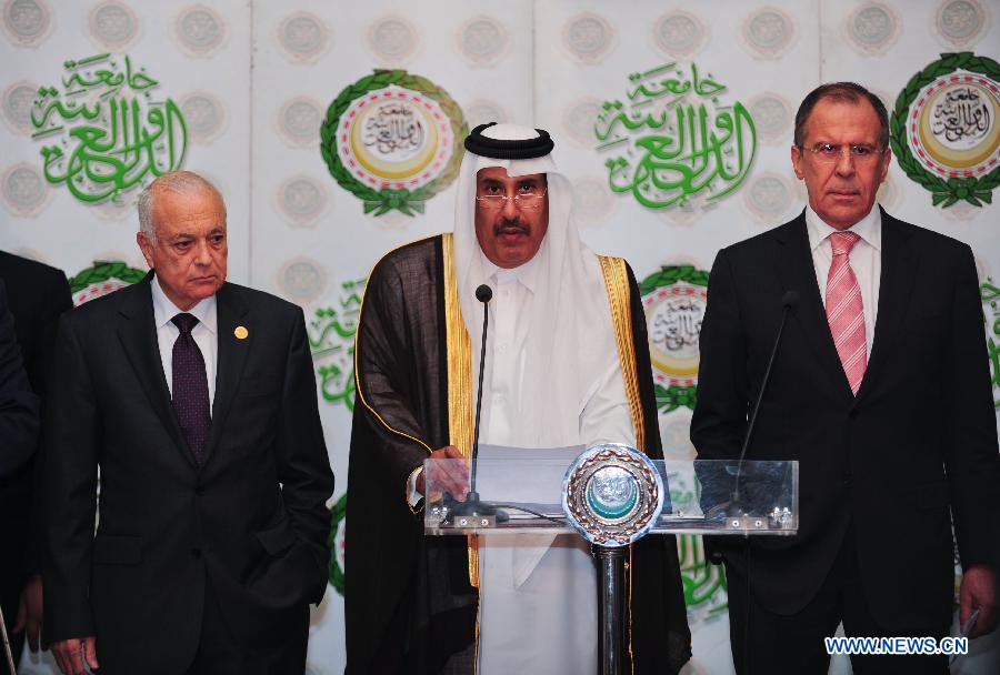 Qatar's Prime Minister and Head of the Arab League committee on Syria, Sheikh Hamad bin Jassem al-Thani (C) speaks during a press conference with Russian Foreign Minister Sergei Lavrov (R) and Arab League Secretary General Nabil al-Arabi after meeting in Cairo, Egypt, March 10, 2012. Visiting Russian Foreign Minister Sergei Lavrov met Saturday with the Arab League (AL) foreign ministers and agreed on a formula of five points to resolve the year-long Syrian crisis. [Qin Haishi/Xinhua]