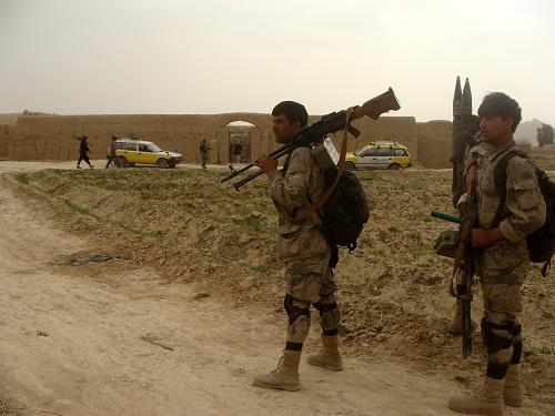 Afghan National Army soldiers keep watch near the killing site in Kandahar province, March 11, 2012. [Photo/Agencies] 