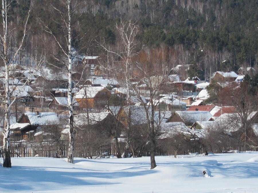 A village is seen near Lake Baikal in the southern part of the Siberian area in Russia on March 10, 2012. (Xinhua/Lu Guodong) 