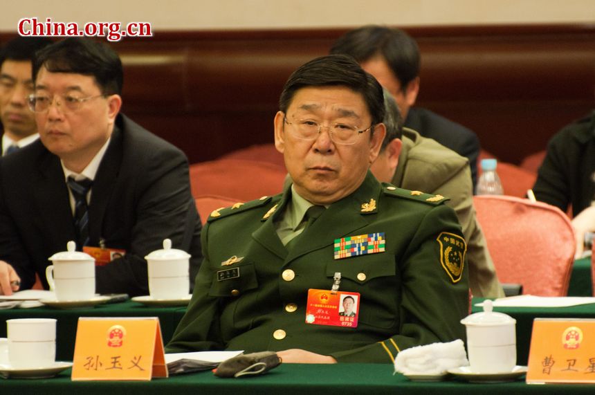 Sun Yuyi, Major General of China&apos;s armed police force, and Jiangsu Province&apos;s delegate to the country&apos;s 11th National People&apos;s Congress, attends the provincial panel meeting on Monday, March 12, 2012 in Beijing. During which he has noted the positive roles played by the armed police force, such as disaster relief and maintaining internal stability. [China.org.cn]