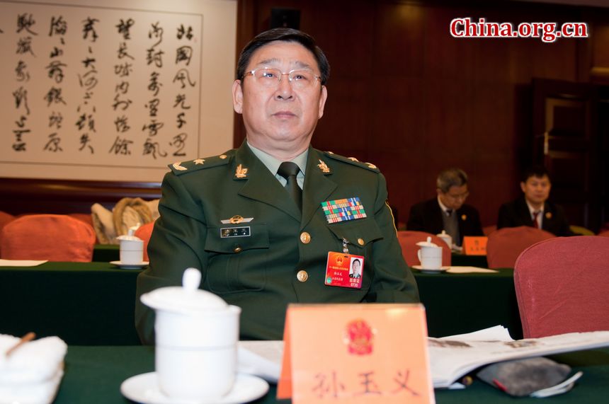 Sun Yuyi, Major General of China&apos;s armed police force, and Jiangsu Province&apos;s delegate to the country&apos;s 11th National People&apos;s Congress, attends the provincial panel meeting on Monday, March 12, 2012 in Beijing. During which he has noted the positive roles played by the armed police force, such as disaster relief and maintaining internal stability. [China.org.cn]
