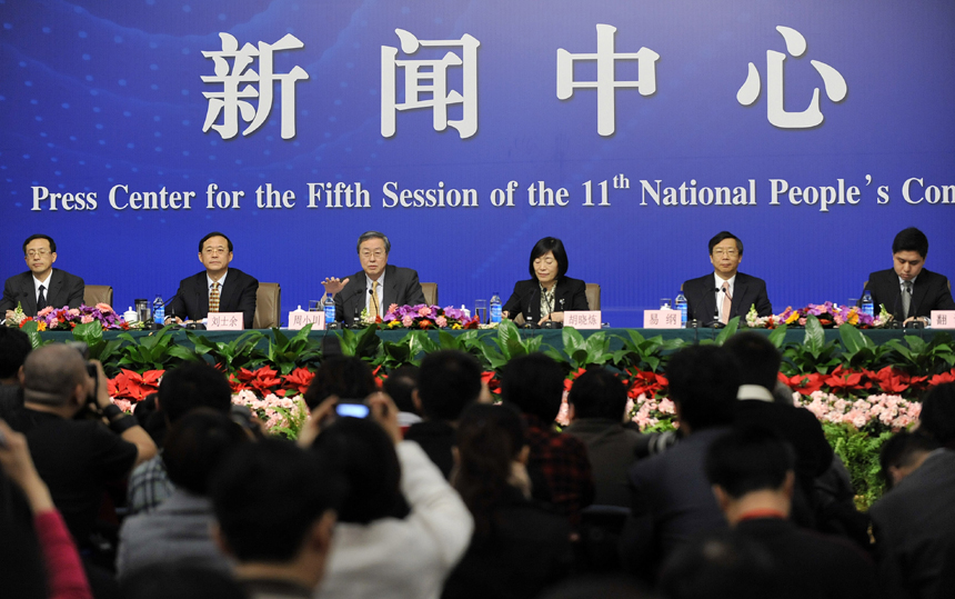 China's central bank held a press conference Monday morning in Beijing during the fifth session of the 11th National People's Congress (NPC). Zhou Xiaochuan, the governor of the bank, answered questions from Chinese and foreign press. 