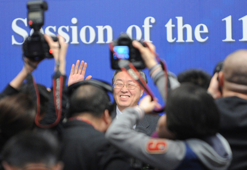 China's central bank held a press conference Monday morning in Beijing during the fifth session of the 11th National People's Congress (NPC). Zhou Xiaochuan, the governor of the bank, answered questions from Chinese and foreign press. [Xinhua photo]