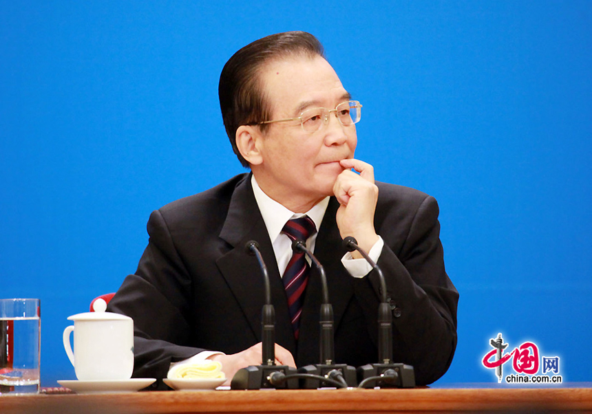 Chinese Premier Wen Jiabao meets the press after the closing meeting of the Fifth Session of the 11th National People's Congress (NPC) at the Great Hall of the People in Beijing, March 14, 2011. 