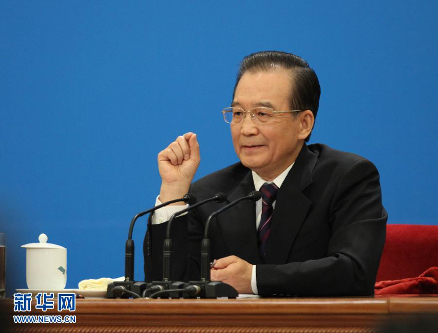 Chinese Premier Wen Jiabao meets the press after the closing meeting of the Fifth Session of the 11th National People's Congress (NPC) at the Great Hall of the People in Beijing, March 14, 2011.