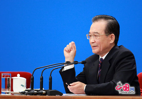 Chinese Premier Wen Jiabao meets the press after the closing meeting of the Fifth Session of the 11th National People's Congress (NPC) at the Great Hall of the People in Beijing, March 14, 2011.