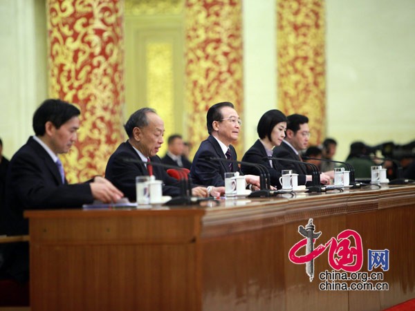 Chinese Premier Wen Jiabao meets the press after the closing meeting of the Fifth Session of the 11th National People's Congress (NPC) at the Great Hall of the People in Beijing, March 14, 2011.