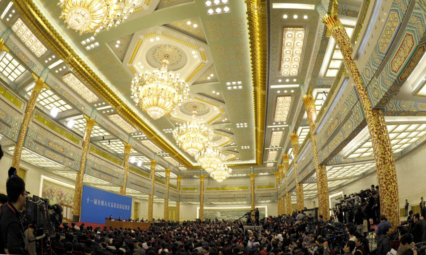 Chinese Premier Wen Jiabao meets the press after the closing meeting of the Fifth Session of the 11th National People's Congress (NPC) at the Great Hall of the People in Beijing, March 14, 2011. 