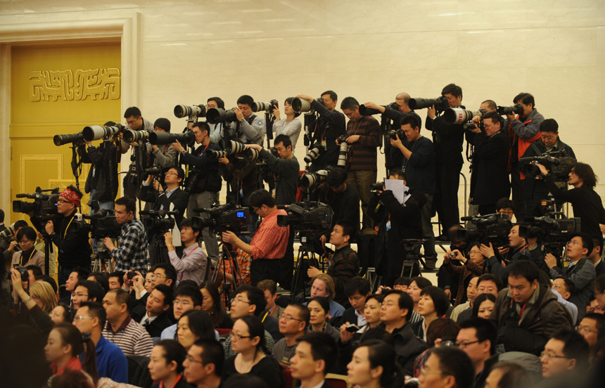 Chinese Premier Wen Jiabao meets the press after the closing meeting of the Fifth Session of the 11th National People's Congress (NPC) at the Great Hall of the People in Beijing, March 14, 2011. 