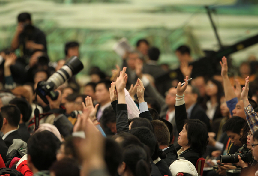 Chinese Premier Wen Jiabao meets the press after the closing meeting of the Fifth Session of the 11th National People's Congress (NPC) at the Great Hall of the People in Beijing, March 14, 2011. 