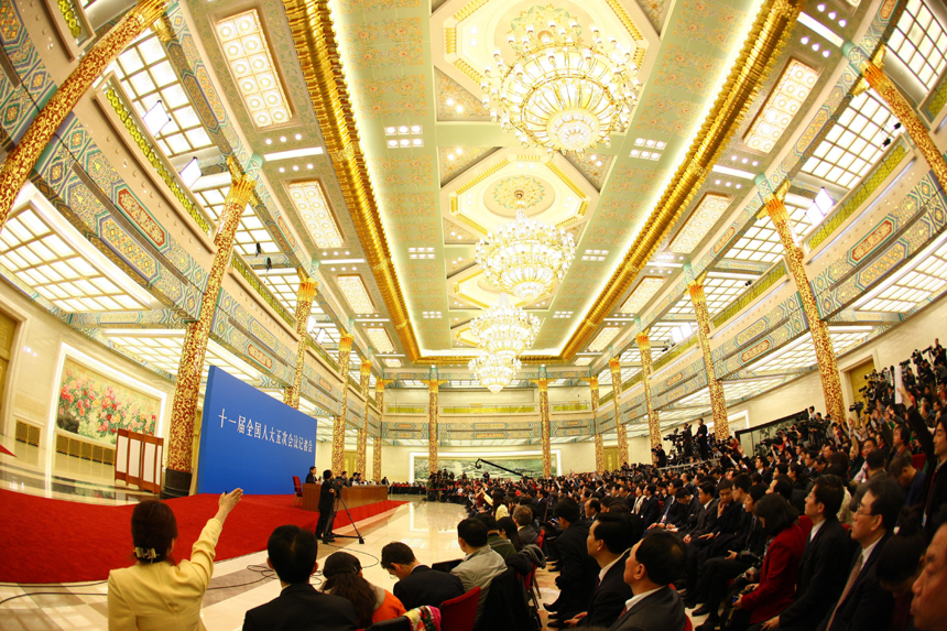 Chinese Premier Wen Jiabao meets the press after the closing meeting of the Fifth Session of the 11th National People's Congress (NPC) at the Great Hall of the People in Beijing, March 14, 2011. 