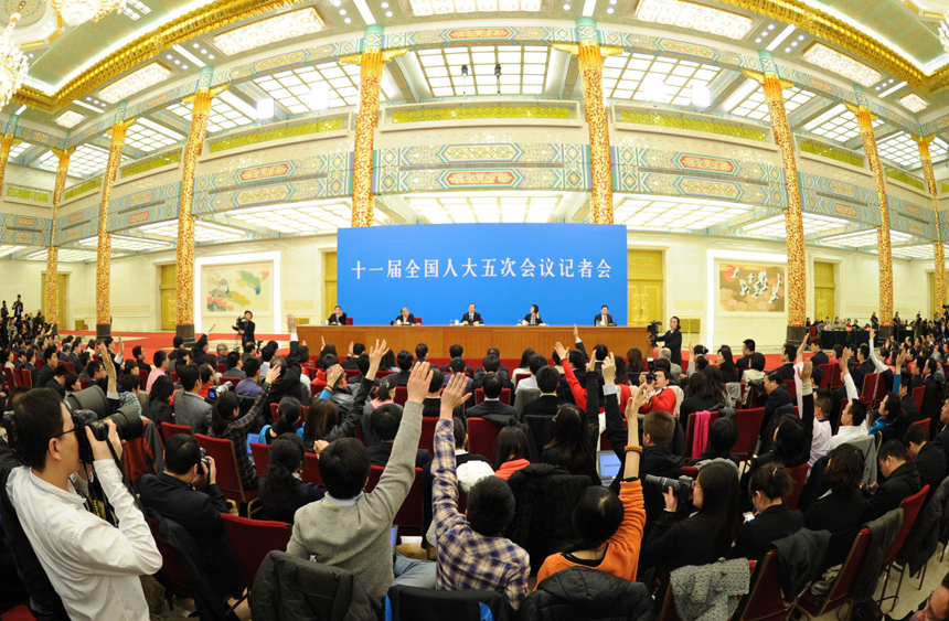 Chinese Premier Wen Jiabao meets the press after the closing meeting of the Fifth Session of the 11th National People's Congress (NPC) at the Great Hall of the People in Beijing, March 14, 2011. 