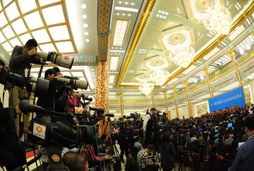 Chinese Premier Wen Jiabao meets the press after the closing meeting of the Fifth Session of the 11th National People's Congress (NPC) at the Great Hall of the People in Beijing, March 14, 2011. 