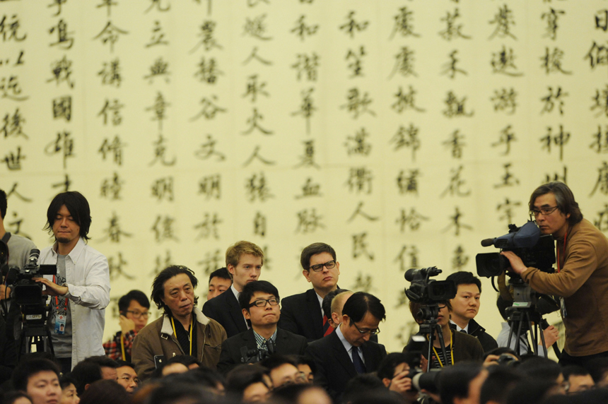 Chinese Premier Wen Jiabao meets the press after the closing meeting of the Fifth Session of the 11th National People's Congress (NPC) at the Great Hall of the People in Beijing, March 14, 2011. 