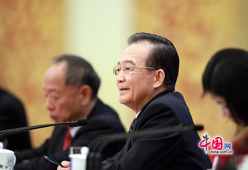 Chinese Premier Wen Jiabao meets the press after the closing meeting of the Fifth Session of the 11th National People's Congress (NPC) at the Great Hall of the People in Beijing, March 14, 2011. 