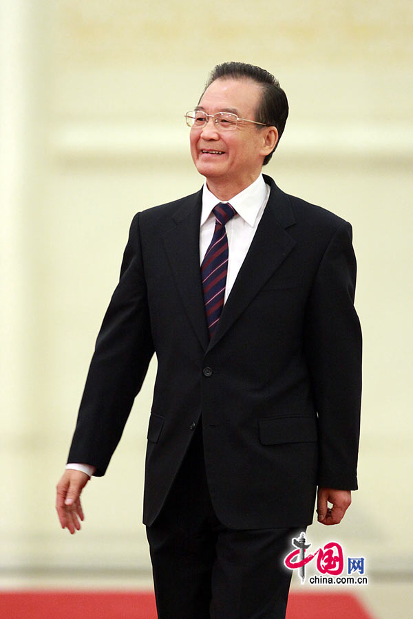 Chinese Premier Wen Jiabao meets the press after the closing meeting of the Fifth Session of the 11th National People's Congress (NPC) at the Great Hall of the People in Beijing, March 14, 2011. 