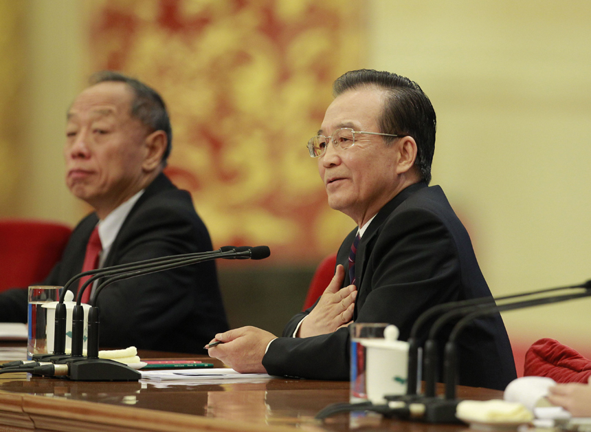 Chinese Premier Wen Jiabao meets the press after the closing meeting of the Fifth Session of the 11th National People's Congress (NPC) at the Great Hall of the People in Beijing, March 14, 2011. 