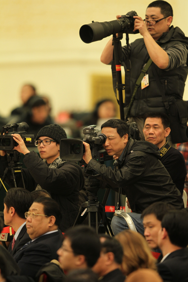 Chinese Premier Wen Jiabao meets the press after the closing meeting of the Fifth Session of the 11th National People's Congress (NPC) at the Great Hall of the People in Beijing, March 14, 2011. 