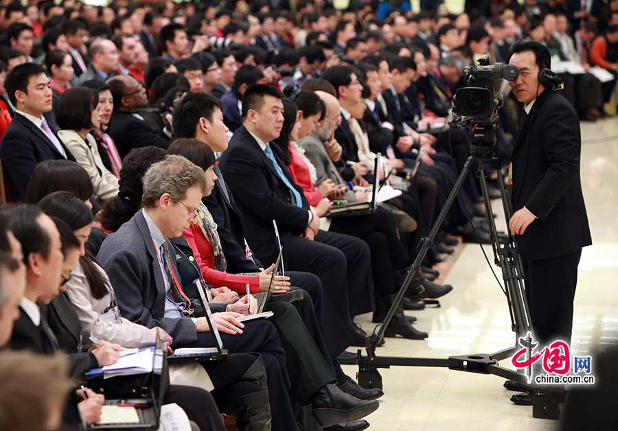 Chinese Premier Wen Jiabao meets the press after the closing meeting of the Fifth Session of the 11th National People's Congress (NPC) at the Great Hall of the People in Beijing, March 14, 2011.