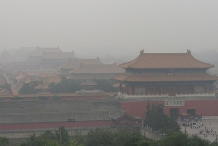 Heavy fog shrouds Beijing's Palace Museum.