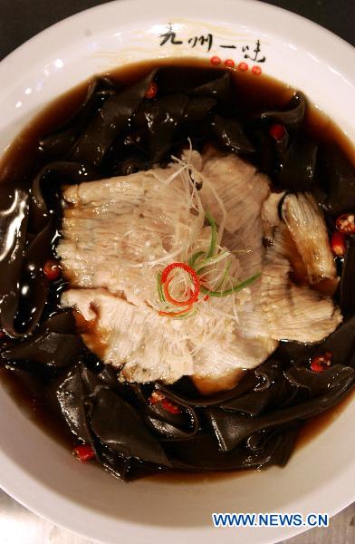 File photo taken on Sept 26, 2010 shows a kind of Sichuan Cuisine dish in Chengdu, southwest China's Sichuan province.[Photo/Xinhua]