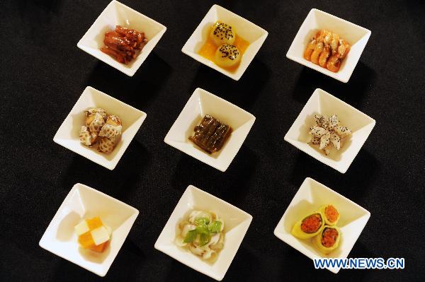 File photo taken on Sept 26, 2010 shows some cold dishes of Sichuan Cuisine in Chengdu, southwest China's Sichuan province. [Photo/Xinhua] 