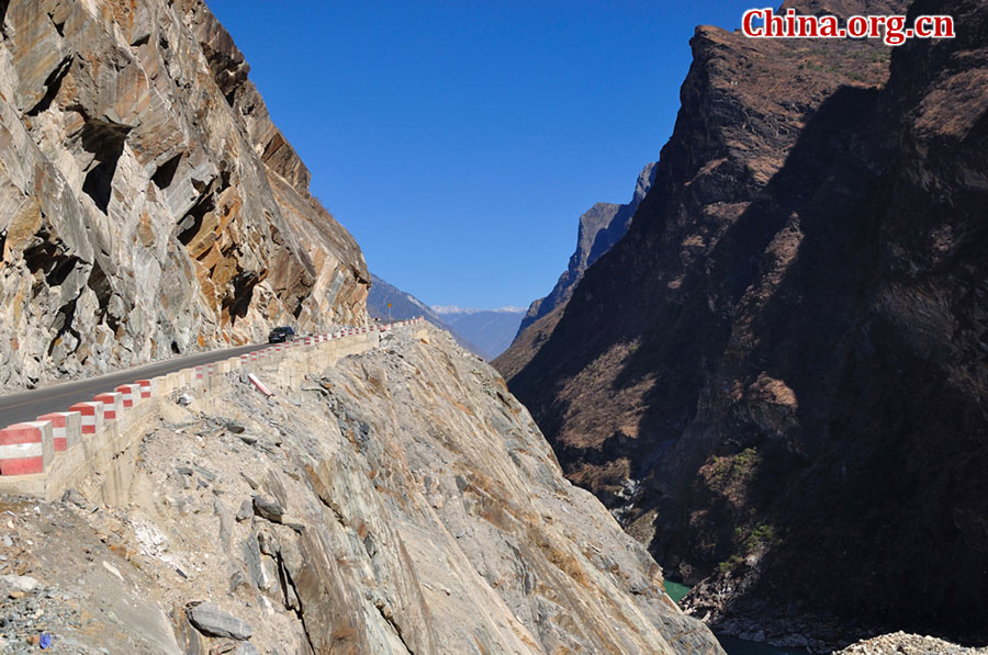 Hutiao Gorge is located on the upper reaches of the Jinsha River, to the northeast of Lijiang, in southwest China's Yunnan Province. The narrowest stretch in the river is only about 30 meters across and carries the legend that a tiger could easily jump across the river. The river is about 29 km long, reaching 3,790 meters in depth between Jade Dragon and Haba Snow Mountains, creating one of the most spectacularly deep gorges in the world. [China.org.cn]