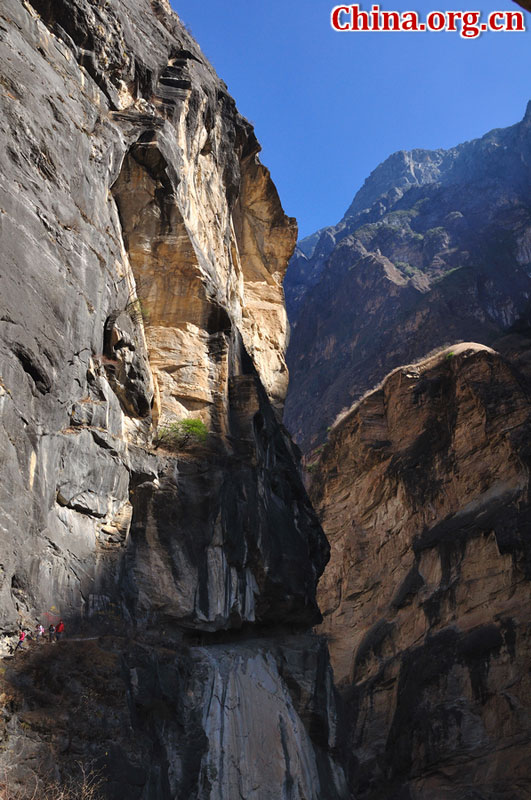 Hutiao Gorge is located on the upper reaches of the Jinsha River, to the northeast of Lijiang, in southwest China's Yunnan Province. The narrowest stretch in the river is only about 30 meters across and carries the legend that a tiger could easily jump across the river. The river is about 29 km long, reaching 3,790 meters in depth between Jade Dragon and Haba Snow Mountains, creating one of the most spectacularly deep gorges in the world. [China.org.cn]