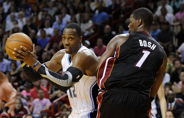 Wade to the rescue as Heat beat Magic