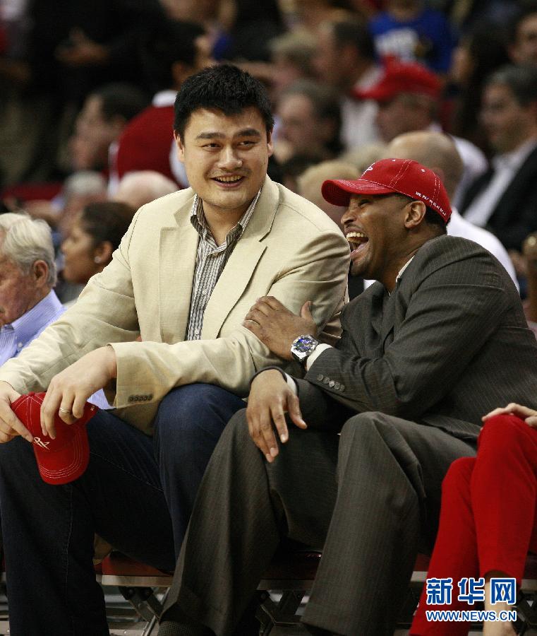  Former Houston Rockets center Yao Ming watches the Rockets play the Los Angeles Lakers in an NBA basketball game Tuesday, March 20, 2012, in Houston.
