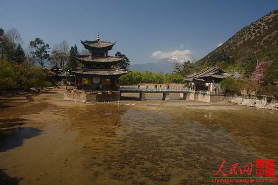 Heilong pond, a symbol of Lijiang, China’s famous tour destination, is dried-up due to the severe drought in Yunan province in recent years. The badly cracked lakebed of Heilong pond destroys the local scenery.