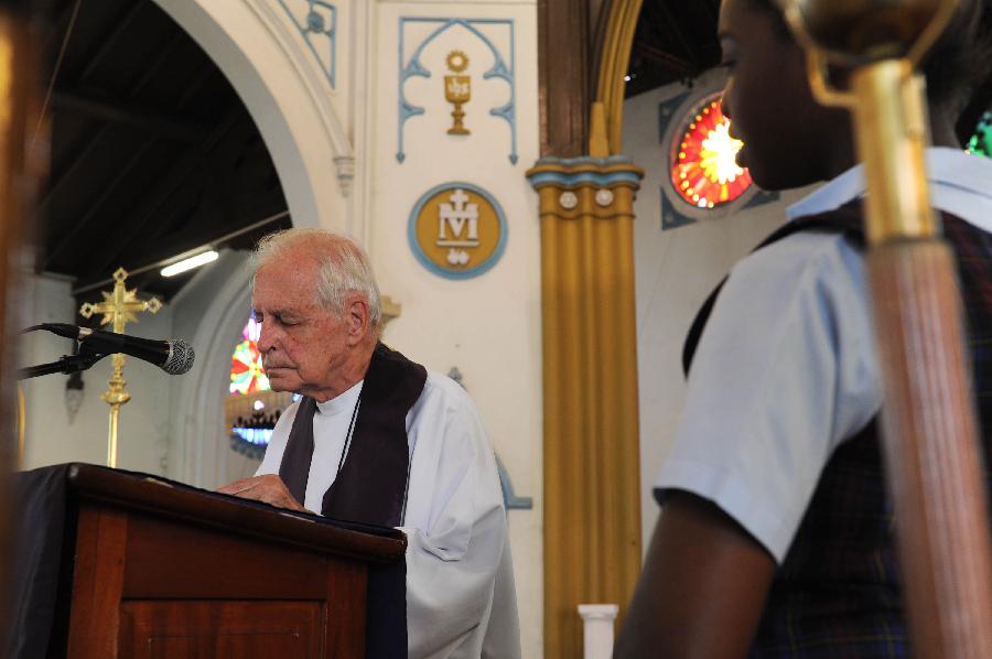  A priest attends mass at the Cathedral of the Immaculate Conception in Port-of-Spain, capital of Trinidad and Tobago to attend mass on March 27, 2012. The Cathedral, built in 1831, is one of the oldest churches in the Caribbean region. (Xinhua/Weng Xinyang) 