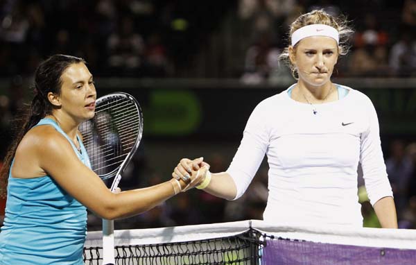 Bartoli ends Azarenka's winning streak