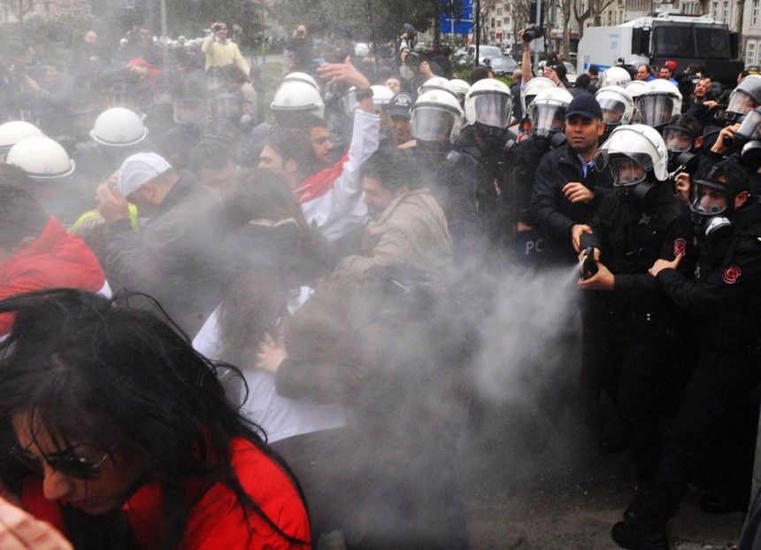 Anti riot police in Istanbul, Turkey, use tear gas to disperse supporters of the Syrian president, Bashar al-Assad, who demonstrate outside the Friends of Syria conference in Istanbul where dozens of countries met to discuss tighter sanctions against the regime. [China.org.cn]