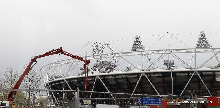 A general view of the ArcelorMittal Orbit Sculpture and the Olympic Stadium is seen in this picture taken on April 3, 2012 in the Olympic Park in London, the United Kingdom. (Xinhua/Wang Lili) 