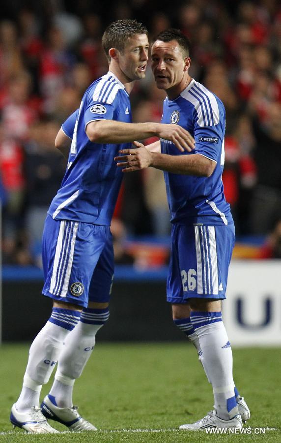 John Terry (R) of Chelsea talks to his teammate Gary Cahill who replaced him during the UEFA Champions League Quarterfinal second leg match between Chelsea and Benfica at Stamford Bridge on April 4, 2012 in London. (Xinhua/Wang Lili)