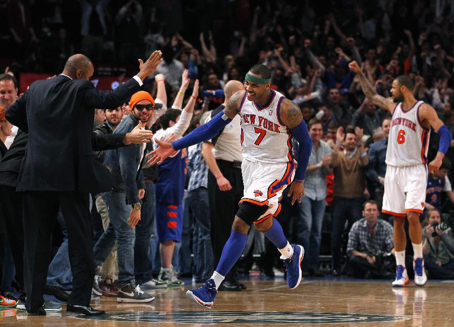 New York Knicks forward Carmelo Anthony (7) celebrate after defeating the Chicago Bulls in their NBA basketball game at Madison Square Garden in New York, April 8, 2012. (Xinhua/ Reuters Photo) 