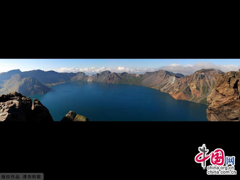 Changbai Mountain in southeastern Jilin Province is located on the border between China and North Korea. Considered as the most famous mountain in northeast China, Changbai Mountain has rich biodiversity. With an average altitude of 2,000 meters, the mountain is well-known for its snowy scenery, cool summers and an abundance of mineral springs.[China.org.cn] 
