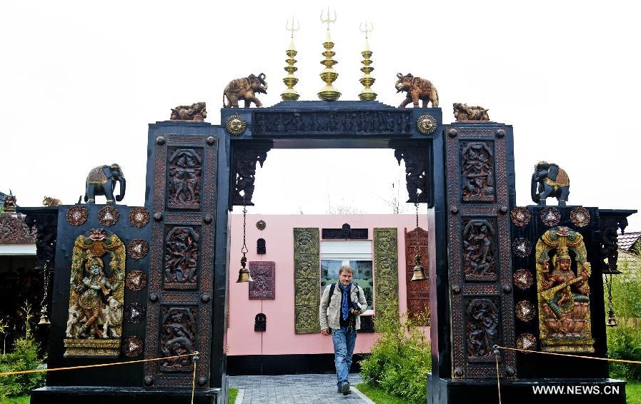 A visitor visits the Indian Garden at the Floriade 2012 in Venlo, the Netherlands, April 12, 2012. The Floriade 2012 exposition, a once-a-decade gardening extravaganza, opened to the public on Thursday featuring displays from 35 different countries. (Xinhua/Robin Utrecht) 