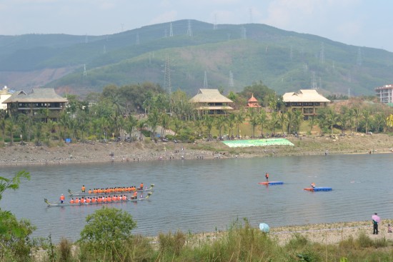 Dragon boats line up for a race at the start of the Dai New Year holiday in Jinghong City, Yunnan Province, Apr. 13.