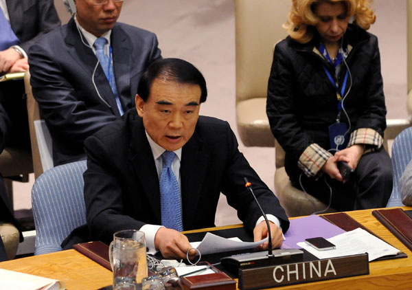 Chinese UN Ambassador Li Baodong addressed the Security Council on April 14 after the 15-member Council adopted a resolution to send an advance team of up to 30 unarmed military observers to Syria. [Shen Hong/Xinhua]
